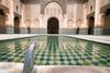 Interior of a traditionally tiled and carved hammam.
