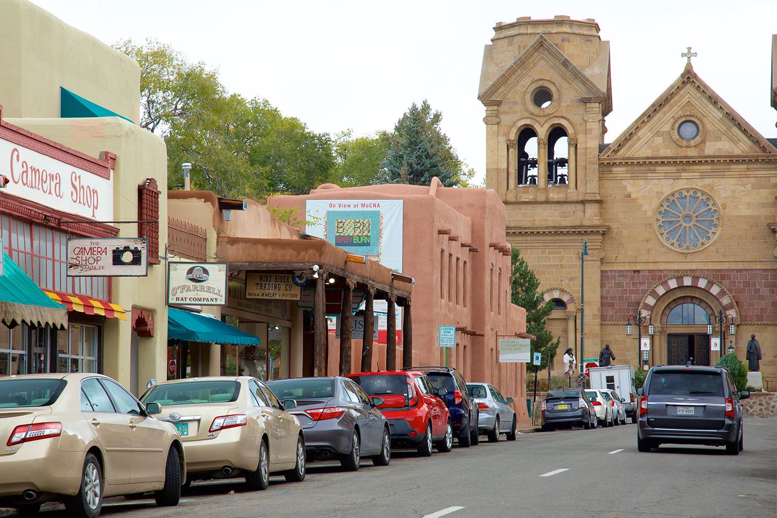 A street view of shops in a city.