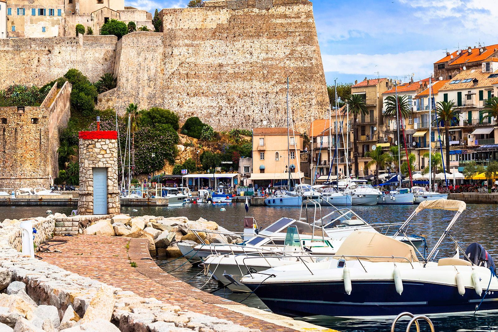 A port with speedboats docked.