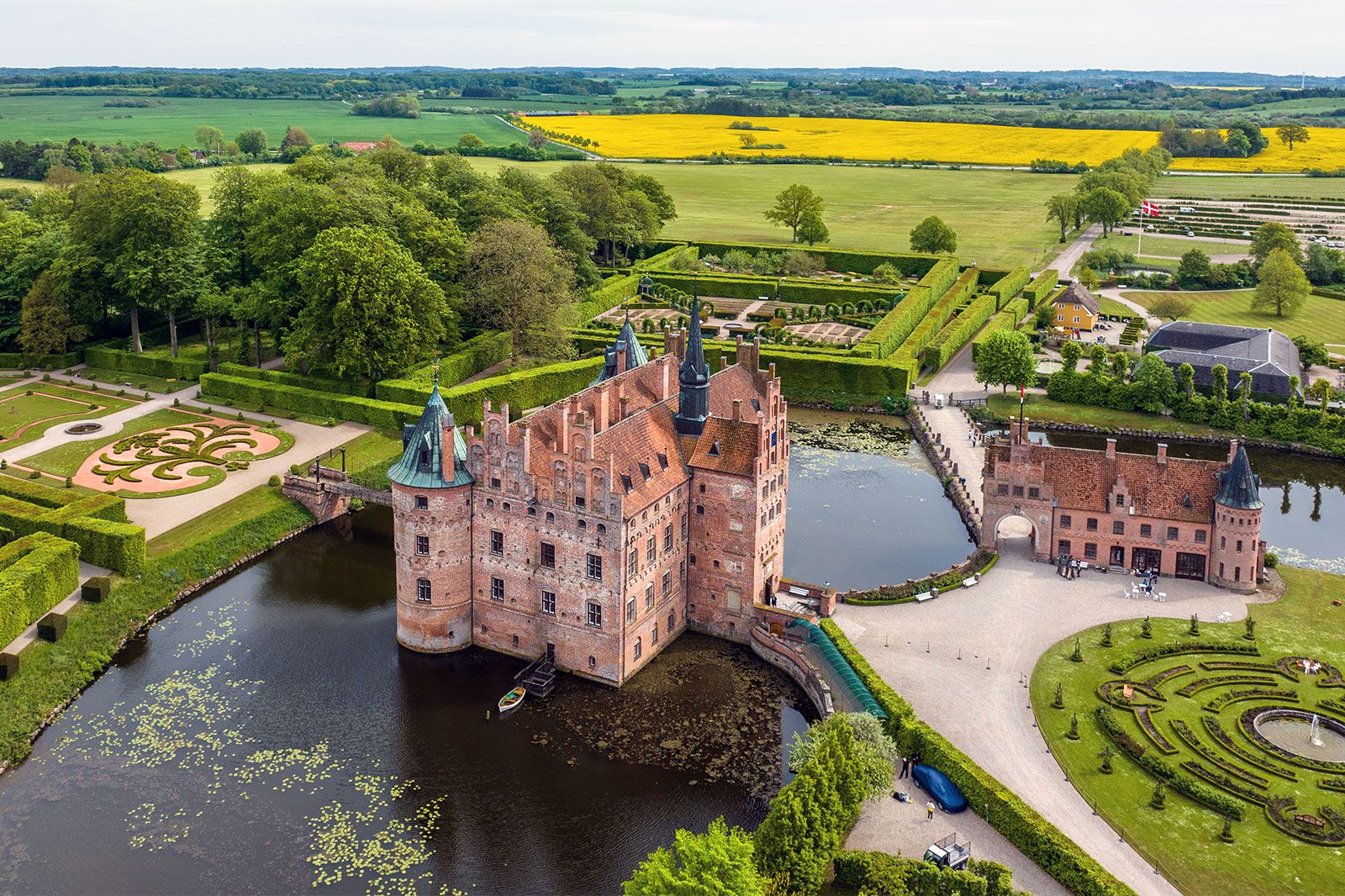 An aerial view of castle with park.