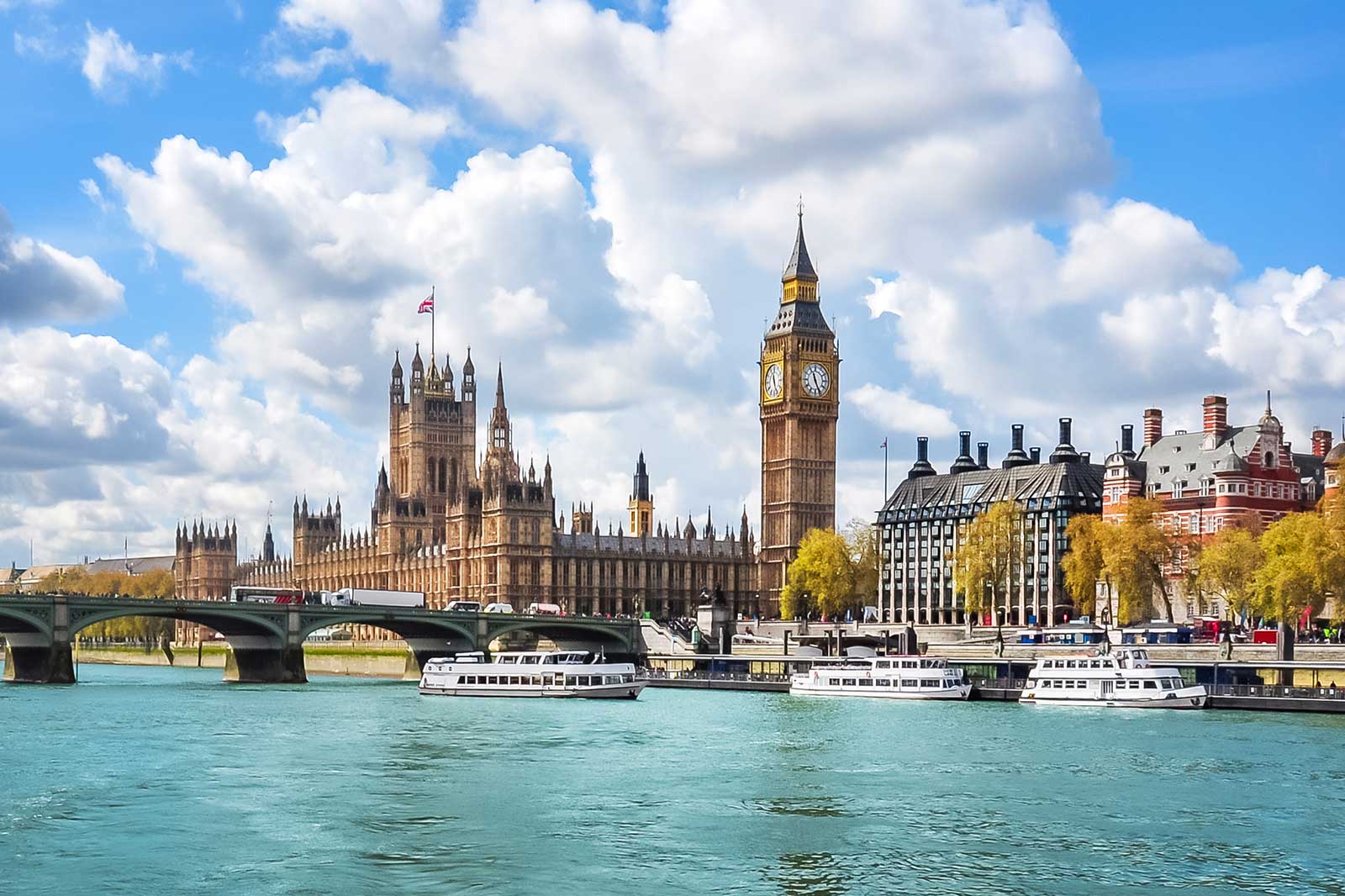 A view over the Thames river to the Houses of Parliament and Big Ben.