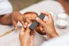 A woman getting a manicure.
