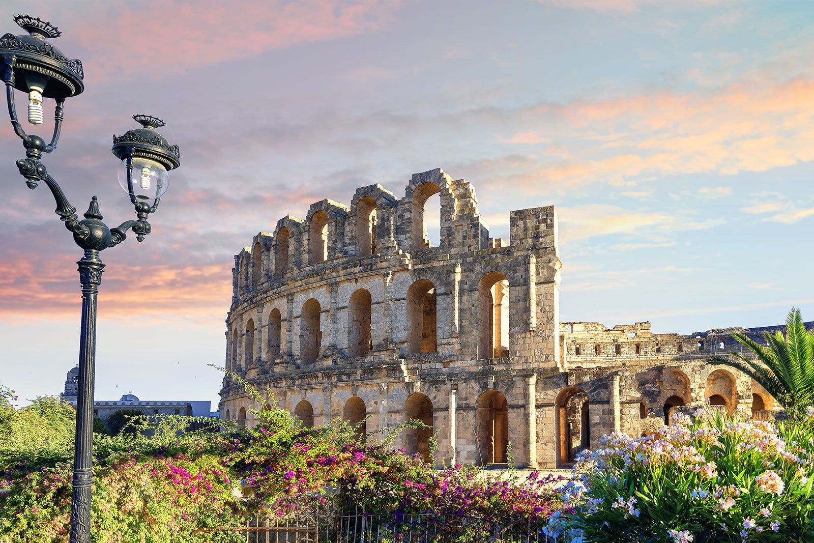 Ancient ruins surrounded by a garden.