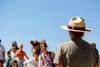 A park ranger talking with a group of people.