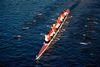 A group of rowers on the water.