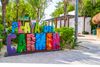 A colorful Playa del Carmen sign.