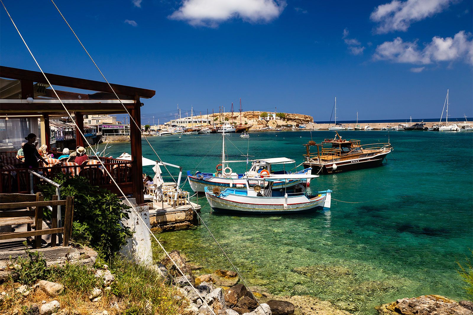 A waterfront restaurant on a harbor.