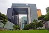 photo by <a href="https://commons.wikimedia.org/wiki/File:Government_Secretariat_(Hong_Kong)_view_in_Tamar_Park-August_2018.jpg" target="_blank" rel="noreferrer">WiNG</a> (<a href="https://creativecommons.org/licenses/by-sa/4.0/" target="_blank" rel="noreferrer">CC BY-SA 4.0</a>) modified