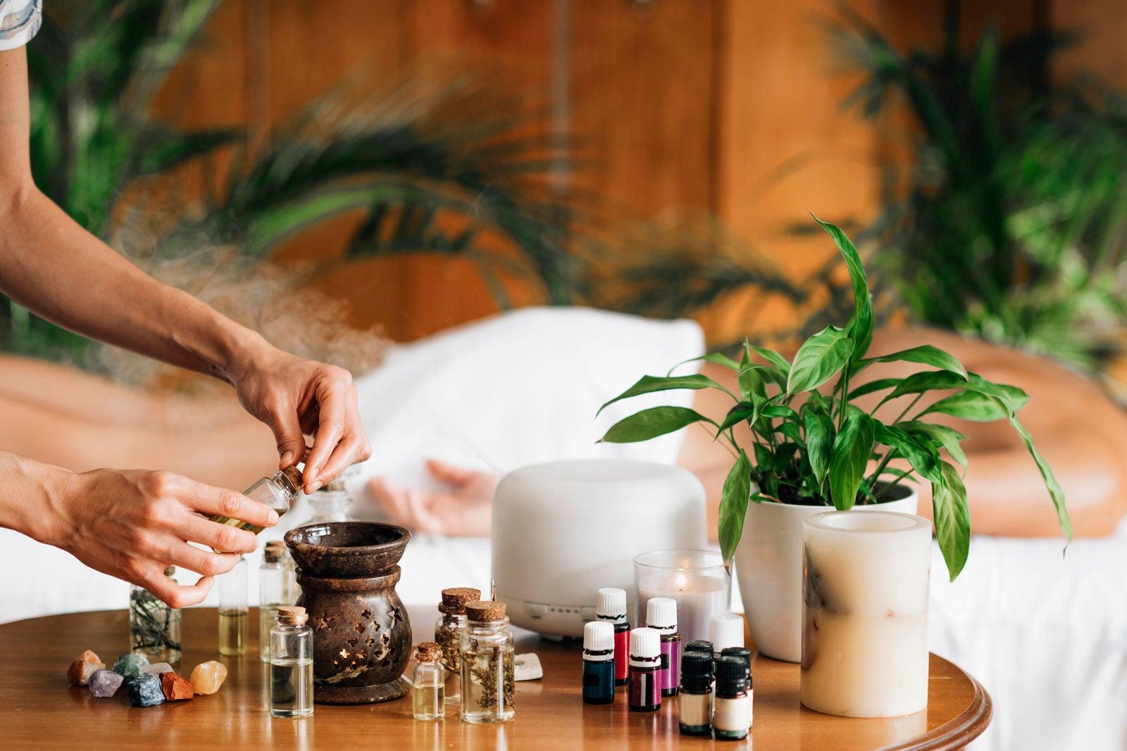 A selection of essential oils being mixed.
