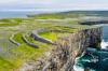 An aerial view of the Dun Aonghasa showcasing the cliffs and the sea in Ireland.