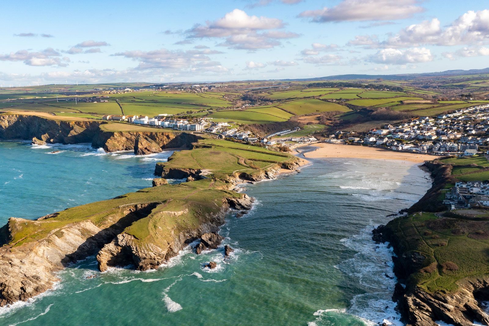 An aerial view of a rocky beach coast.