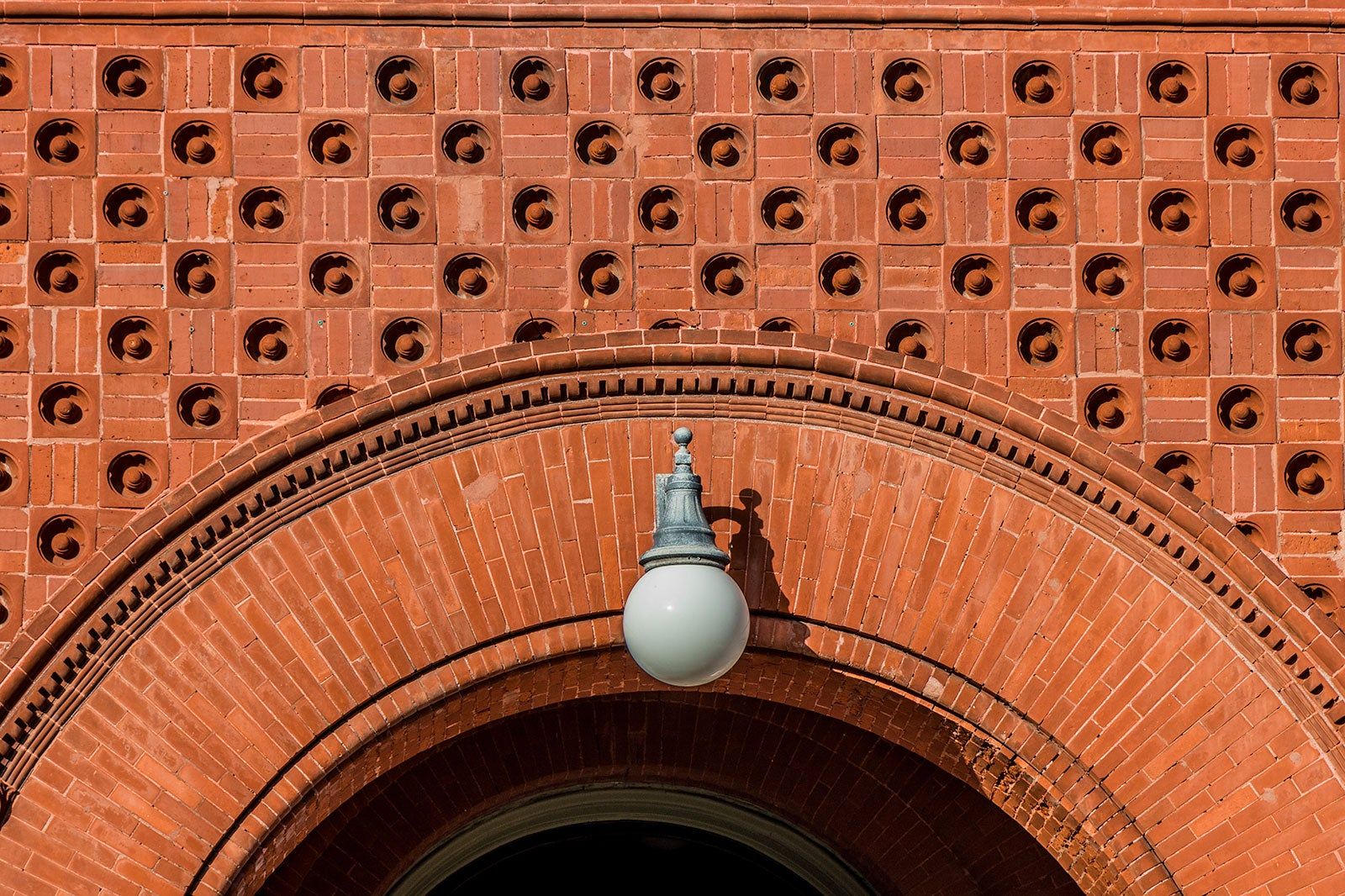 Red bricks and round white light.