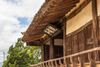 A facade of a traditional wooden house.