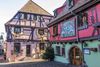 Vibrant Timbered Houses on Riquewihr’s Main Street