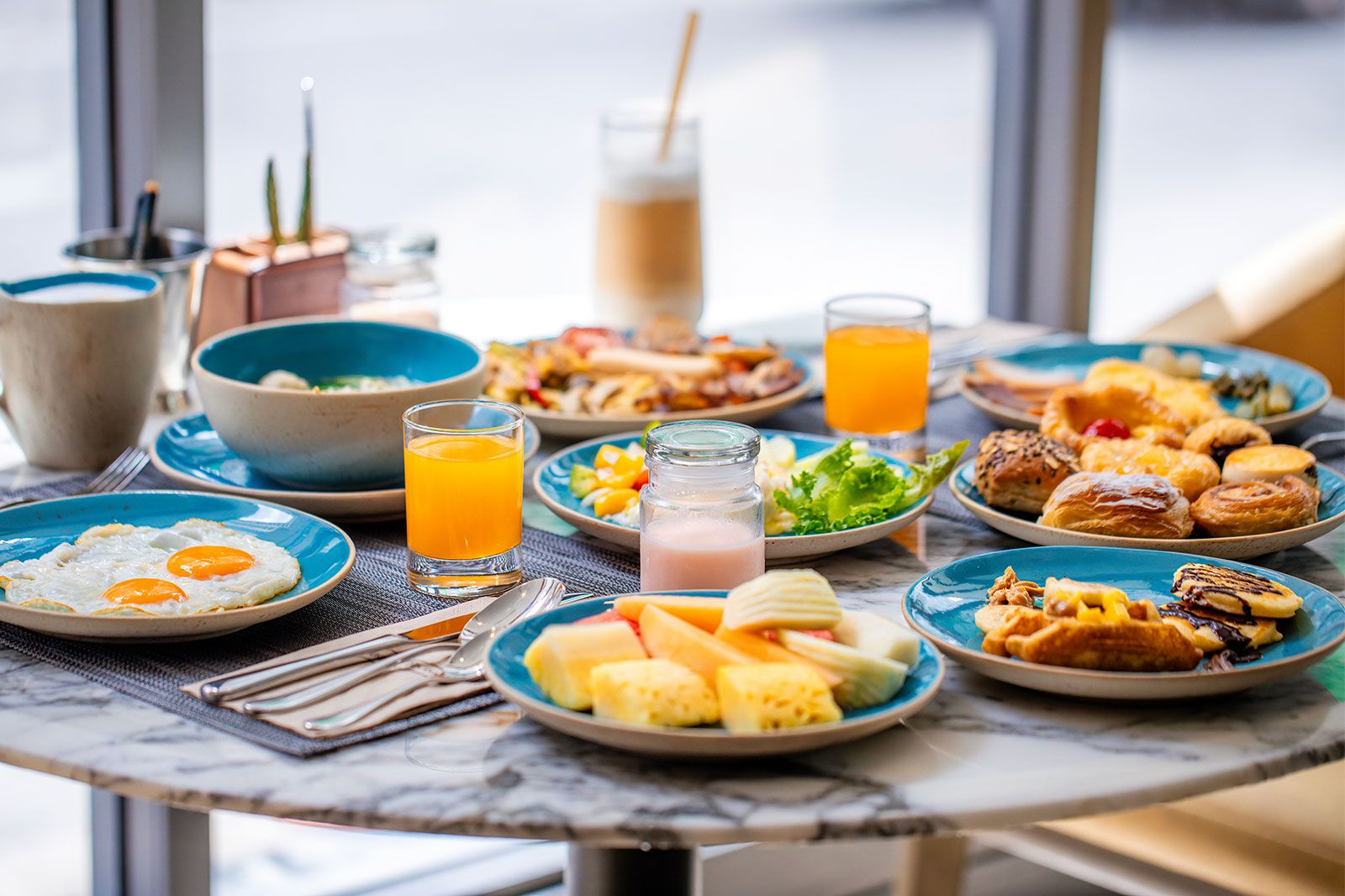 A bright table of breakfast food.