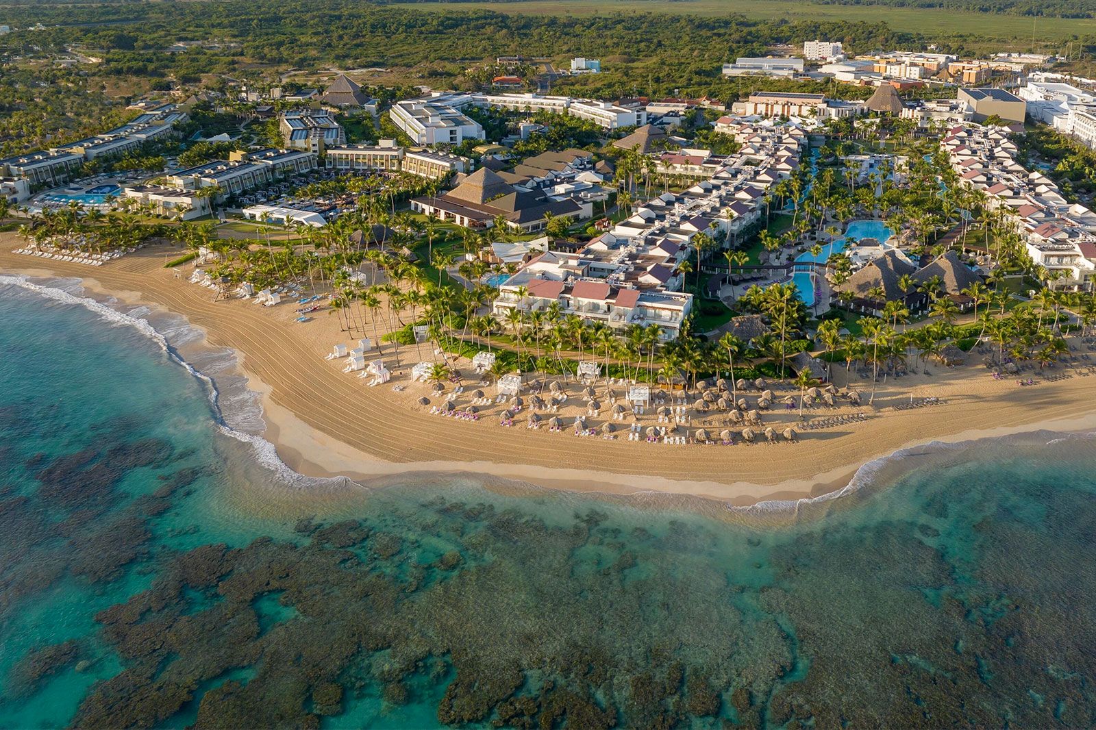 A view of a resort and the ocean.