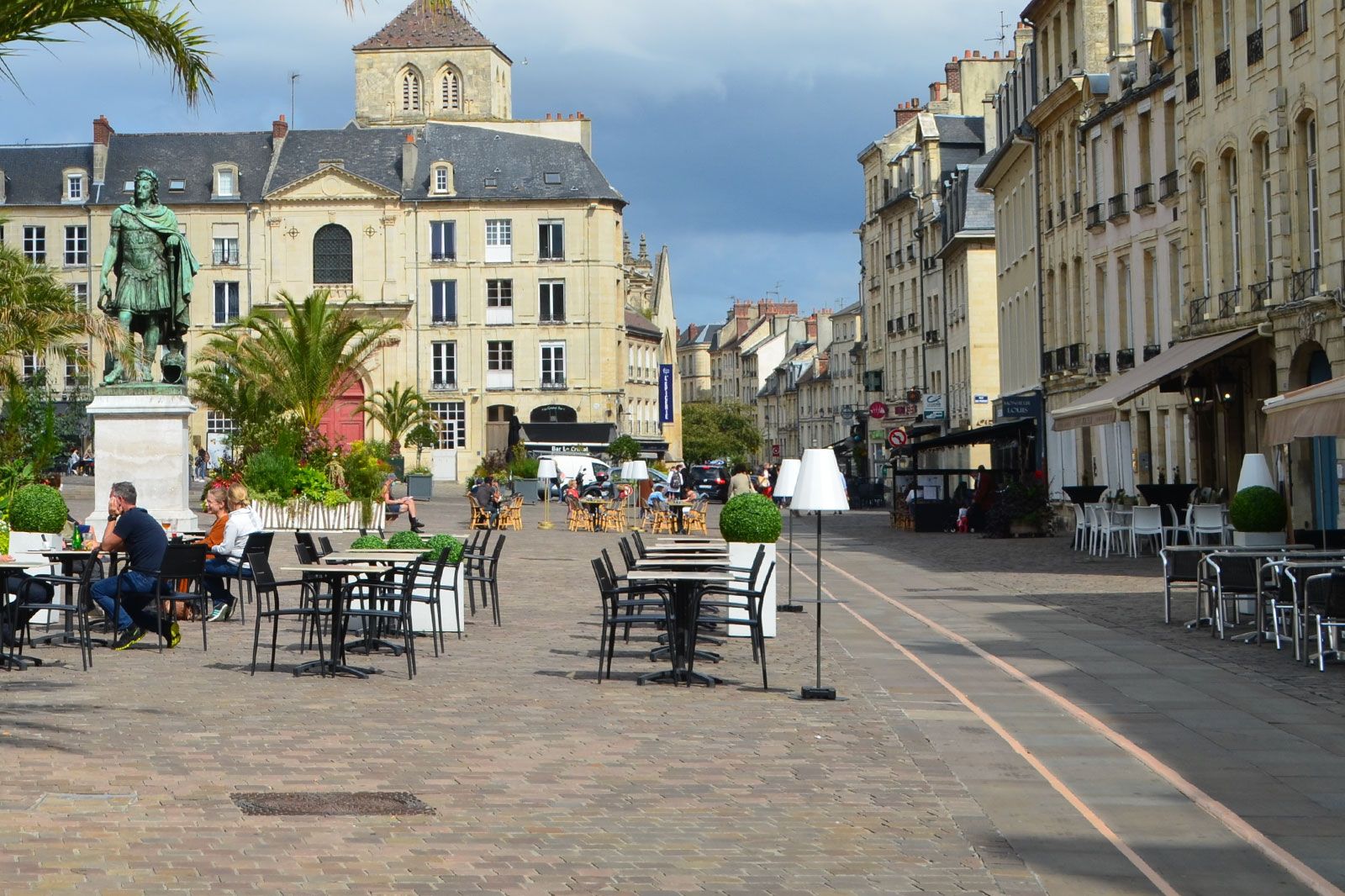 Outdoor seating for a restaurant in a town square. 
