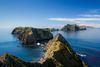 A long distance view of several of the Channel Islands off of California's coast.