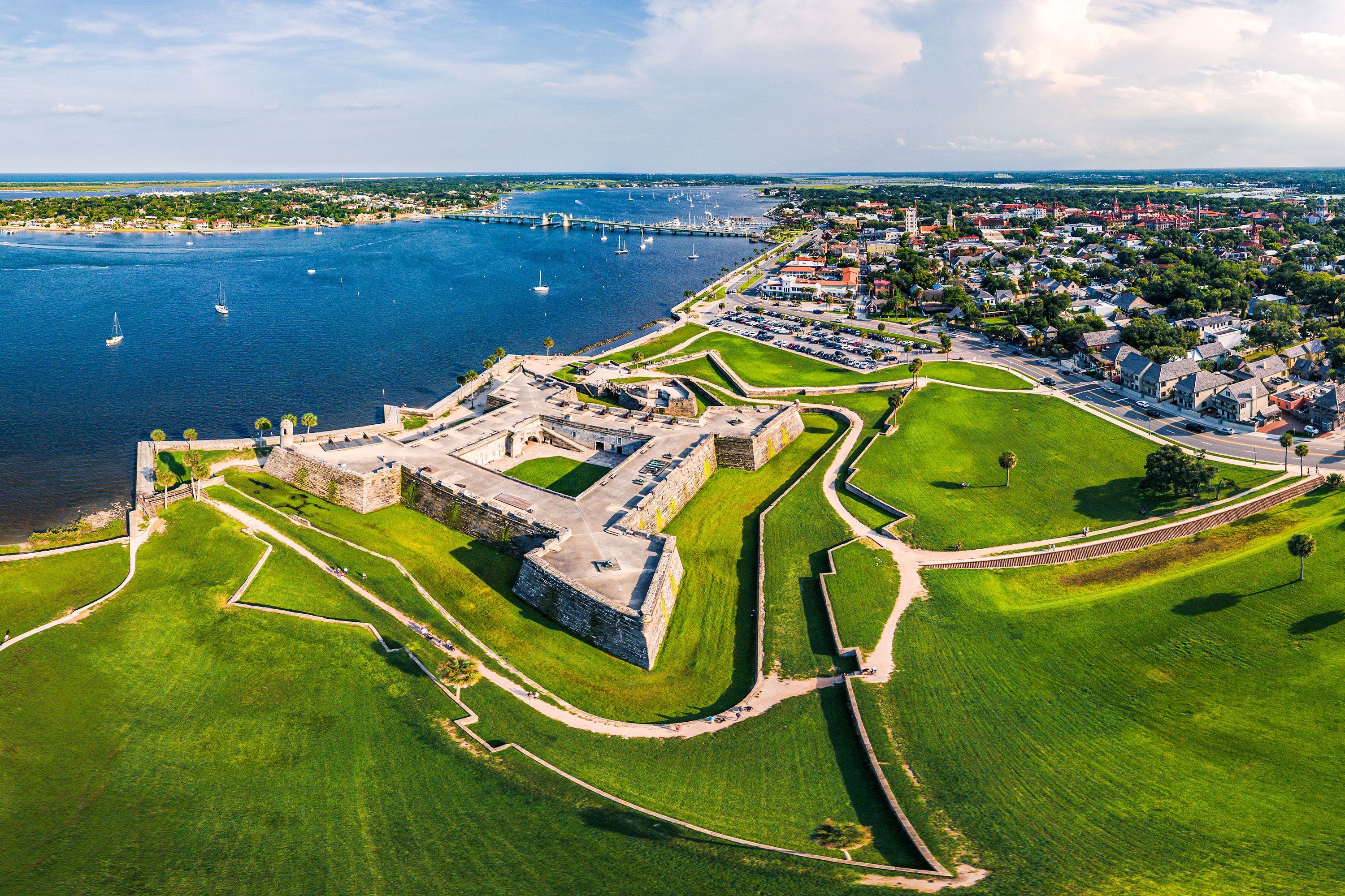 Aerial view of old fort along the water.