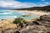 A view a beautiful sandy beach.