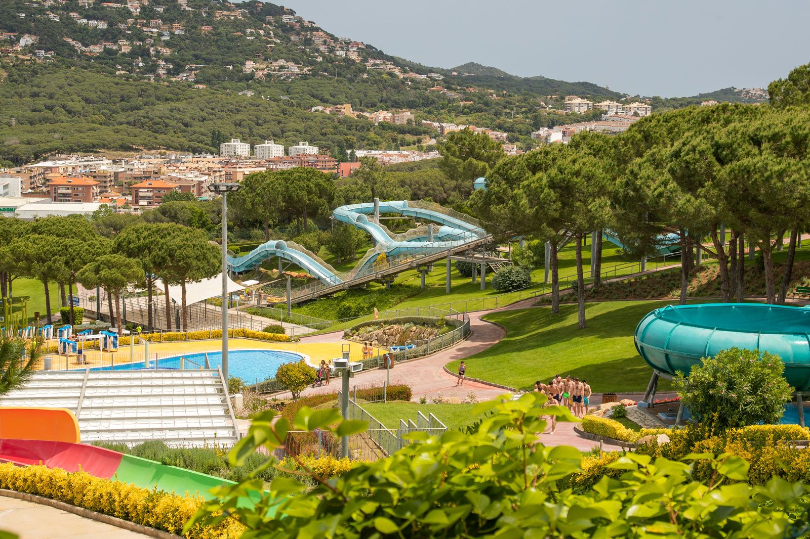 A hilly area in nature with a waterpark.