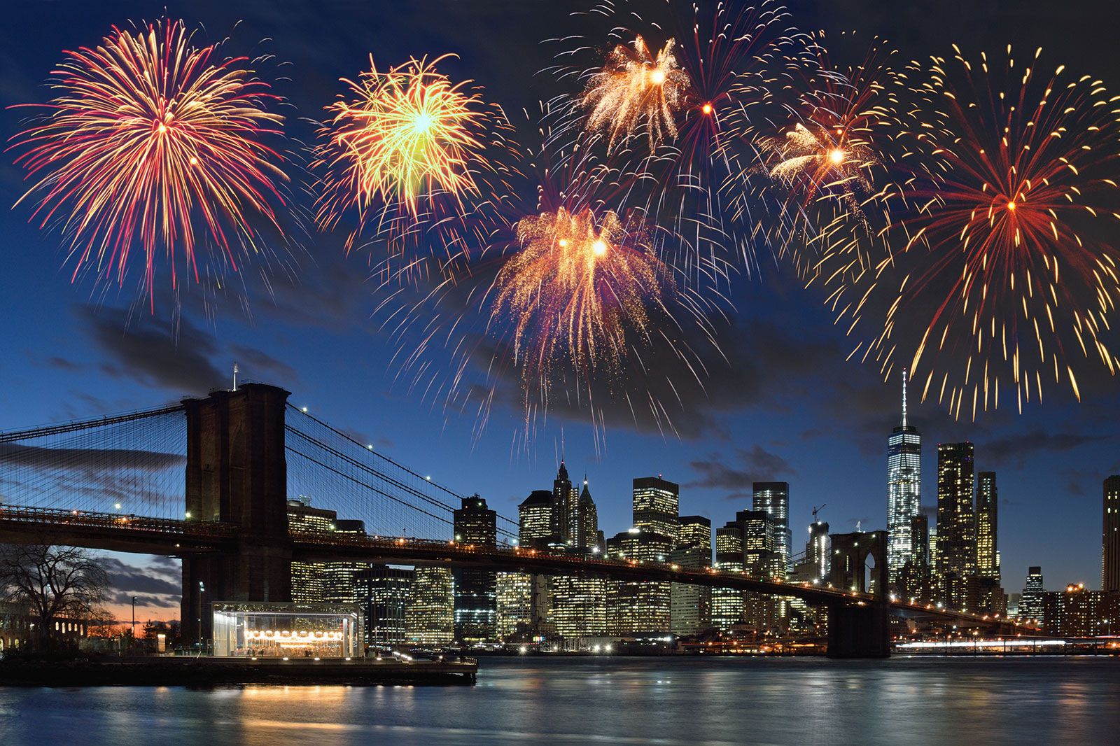 Fireworks are seen over a New York skyline.