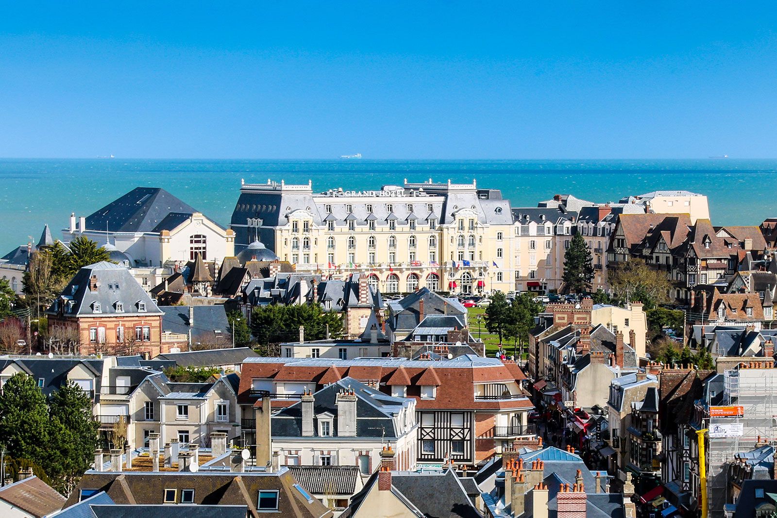 An aerial view of a town on hills.