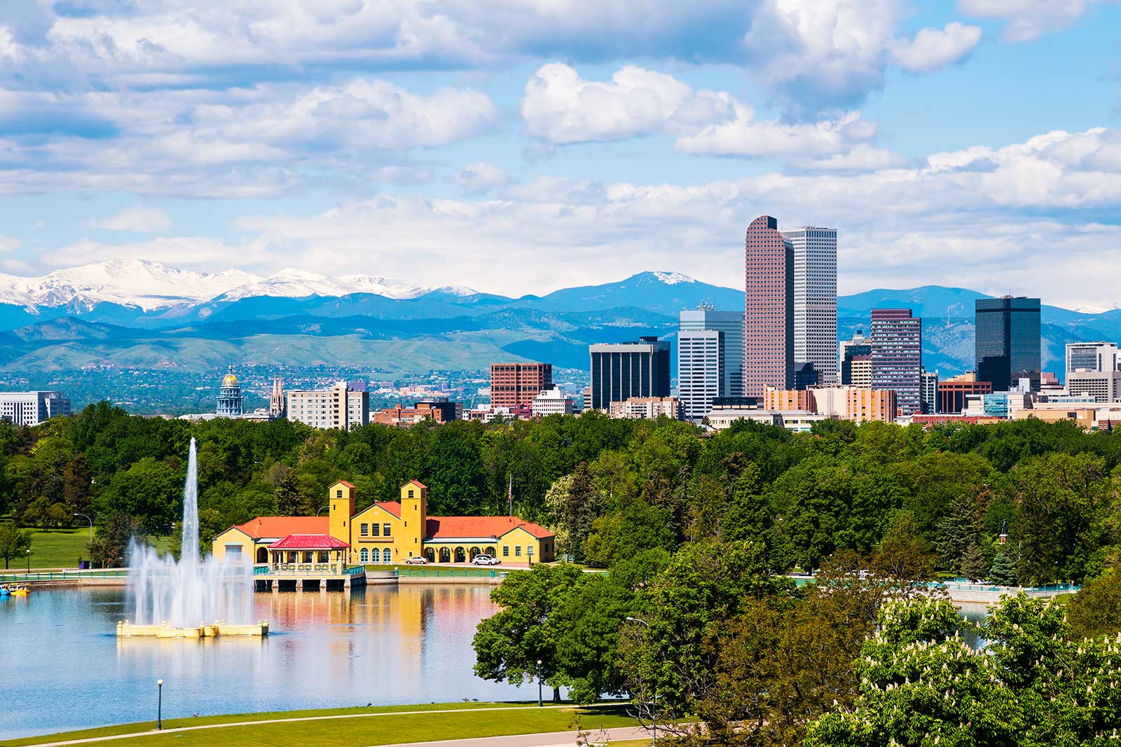 The city skyline with a body of water in the foreground.