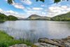 photo by <a href="https://commons.wikimedia.org/wiki/Category:Loweswater#/media/File:Loweswater_23-6-2015_16-19-21.JPG" target="_blank" rel="noreferrer">Paul Hermans</a> (<a href="https://creativecommons.org/licenses/by-sa/3.0/" target="_blank" rel="noreferrer">CC BY-SA 3.0</a>) modified