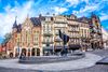 Ornate buildings on city square.