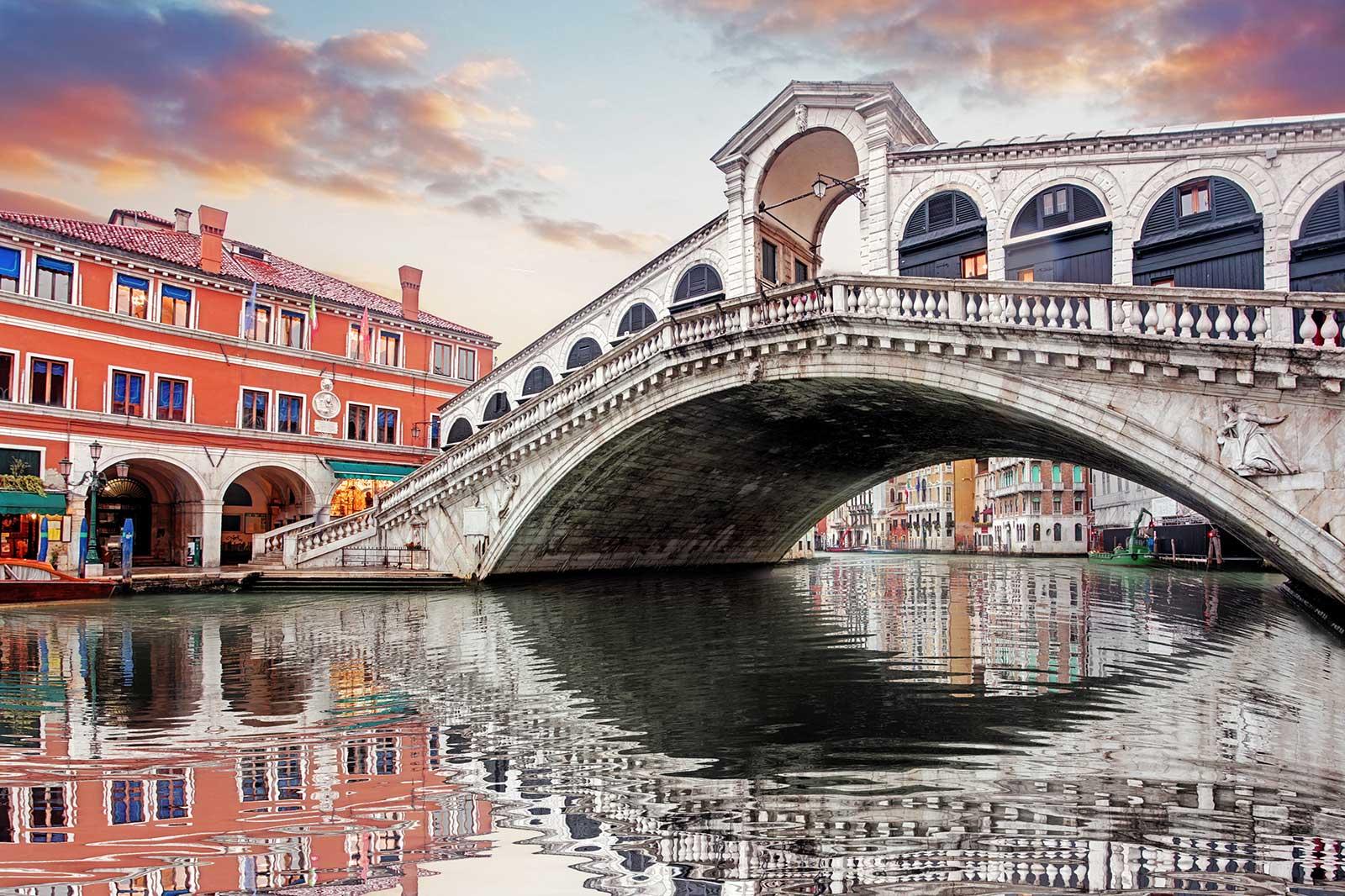 White bridge over a canal.