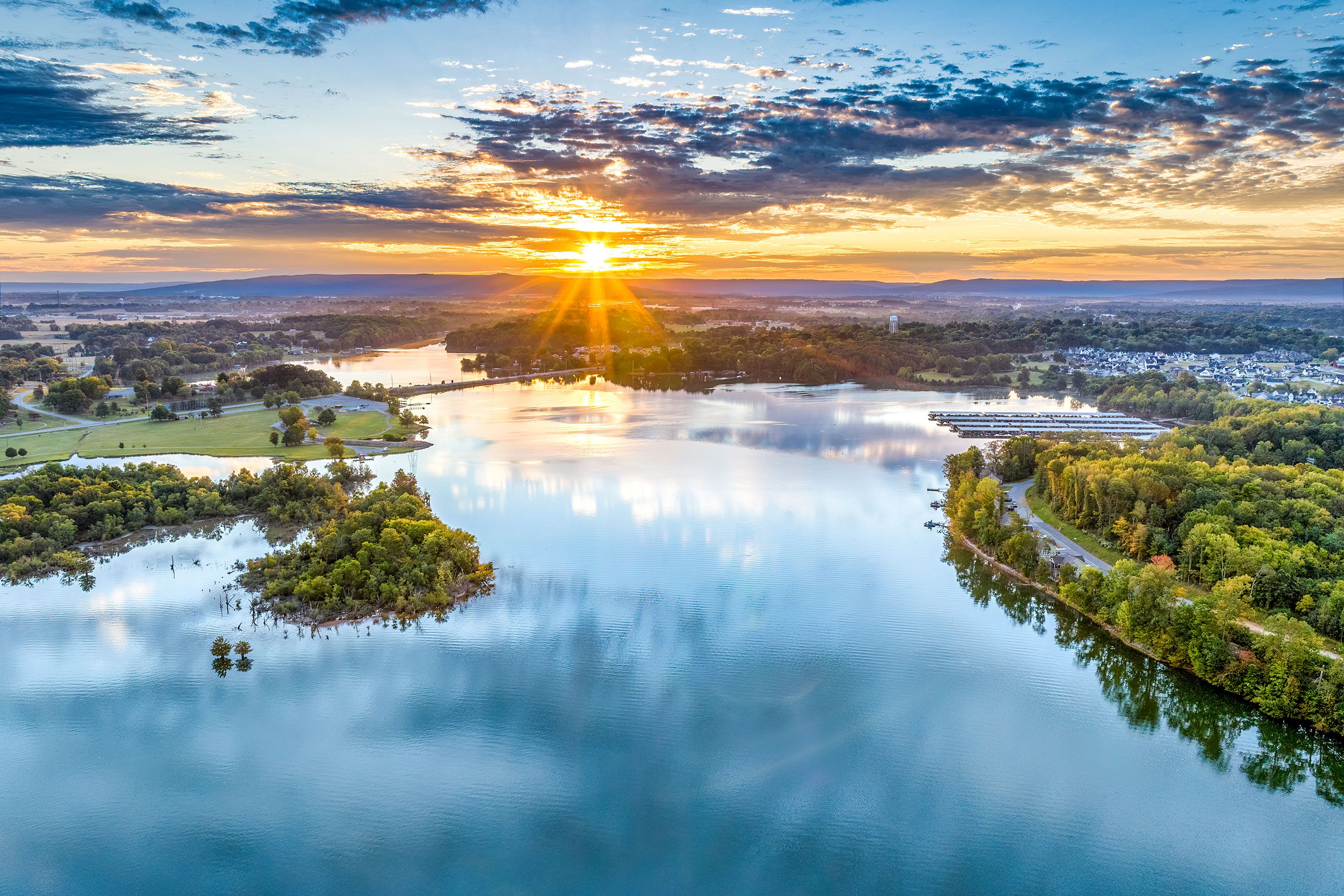 Aerial view of a beautiful morning sunrise over the marina and Bass Club on Tims Ford Lake in Winchester, Tennessee.