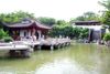 photo by <a href="https://commons.wikimedia.org/wiki/File:Kowloon_Walled_City_Park_%E4%B9%9D%E9%BE%8D%E5%AF%A8%E5%9F%8E_02.jpg" target="_blank" rel="noreferrer">CPJoseph</a> (<a href="https://creativecommons.org/licenses/by-sa/3.0/" target="_blank" rel="noreferrer">CC BY-SA 3.0</a>)  modified