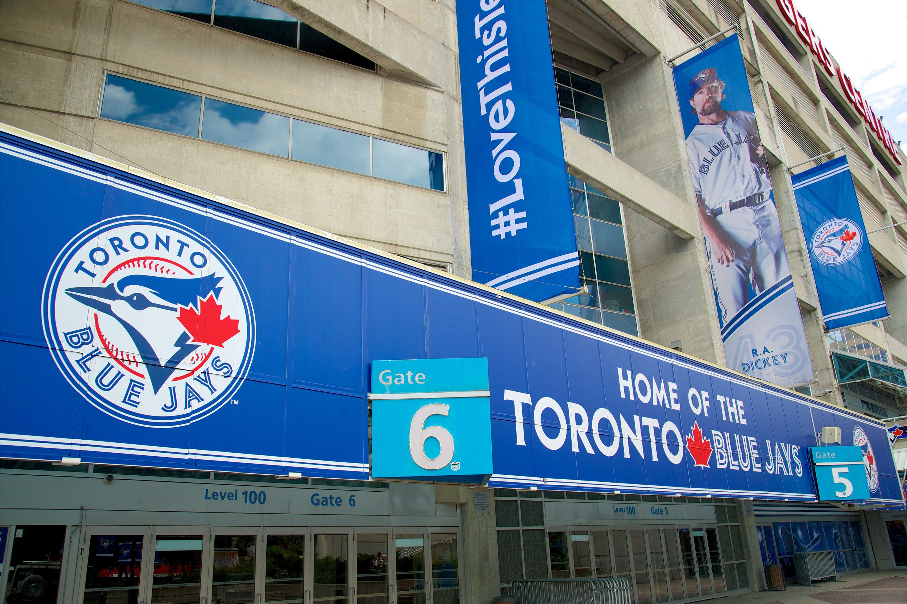 An exterior view of the Toronto Blue Jays stadium entrance with team signage