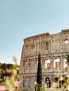 Rome's magnificent Colosseum, seen silhouetted against a blue sky