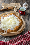 Hungary’s beloved lángos, served the classic cheesy way.