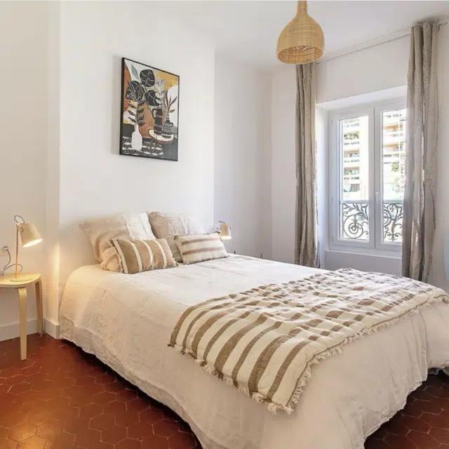 A serene bedroom in a Vrbo in Marseille, France