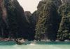 Huge tower karst jut out of the turquoise waters at Maya Bay, rising hundreds of feet above the sea