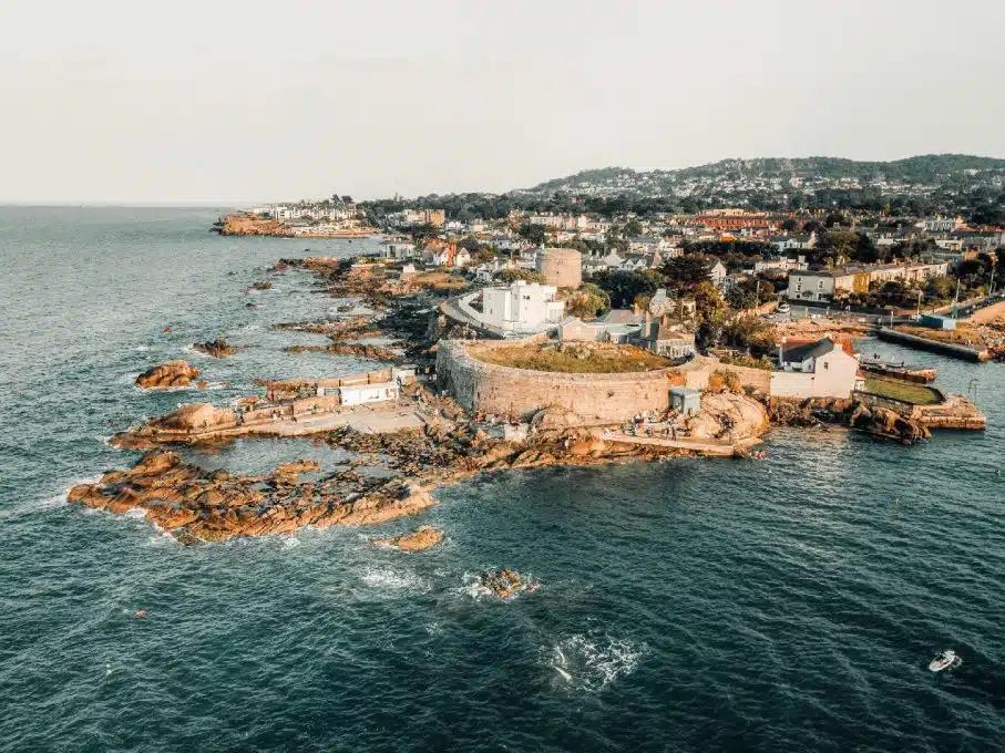 The Irish Sea surrounds the Forty Foot promontory on the southern tip of Dublin Bay in Ireland