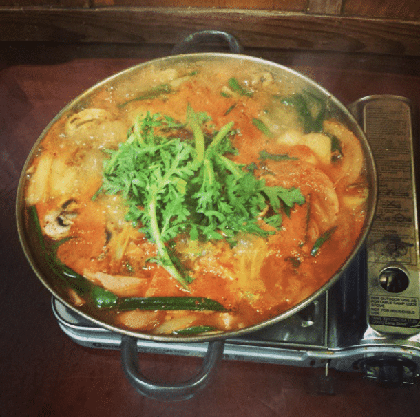 A steaming pan of food on a hotplate at Chunju Han-Il Kwan in Koreatown, Los Angeles