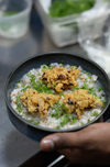 Citrusy fresh seafood crowned with golden fritters and bright herbs.