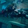Two contestants on The Amazing Race scuba dive at Deep Dive Dubai