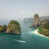 Karst formations rise from the water around Phra Nang Beach in Krabi, Thailand