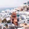 The terracotta cave house, standing out in a sea of white houses on Santorini