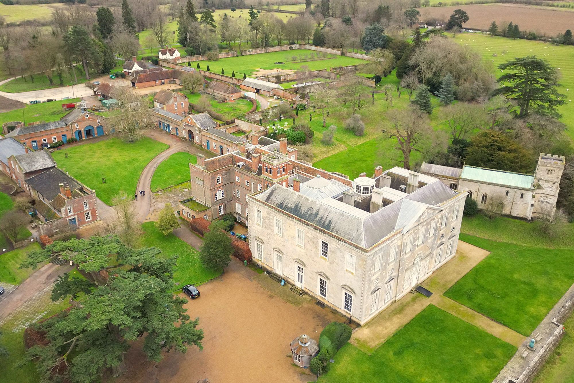 Aerial view of the large sprawling manor that is Claydon House in Aylesbury Vale, Buckinghamshire, England.
