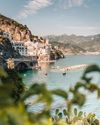 A tiny town slopes down to the water on the Amalfi Coast, southern Italy
