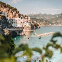 A tiny town slopes down to the water on the Amalfi Coast, southern Italy