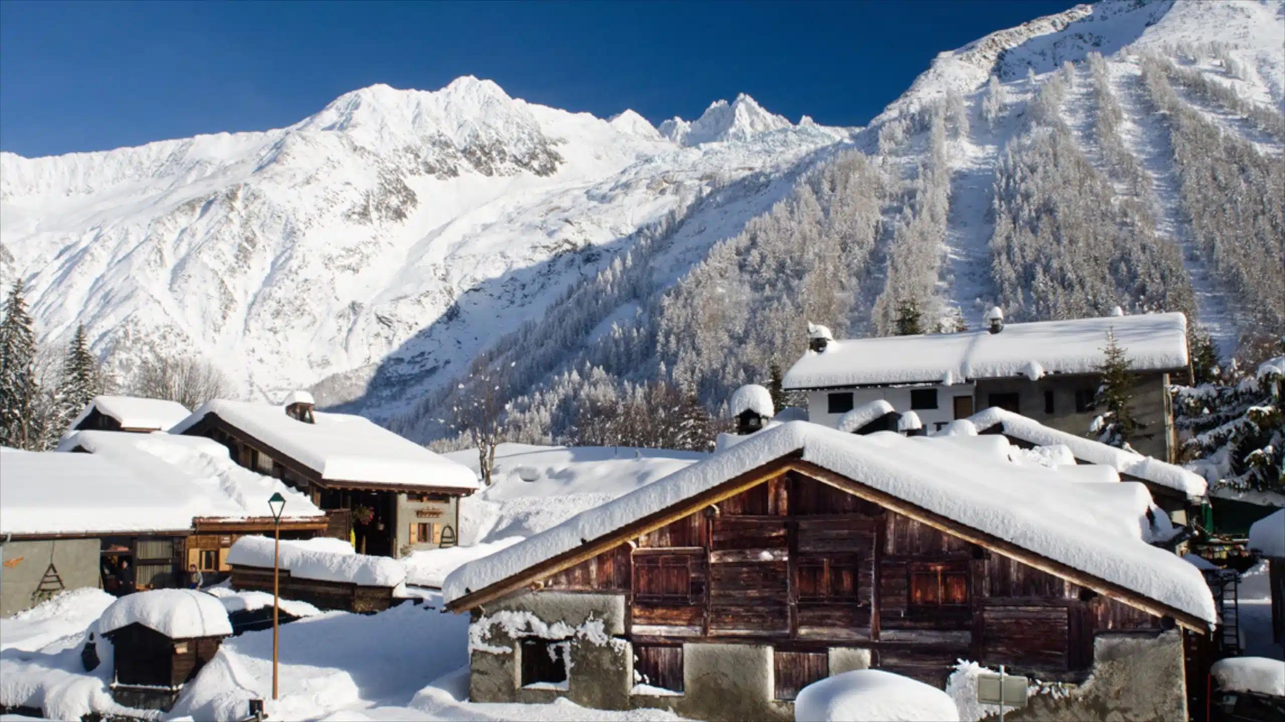 Snow-covered chalets and mountains in Chamonix