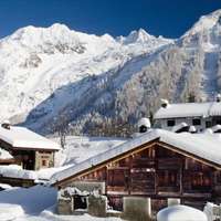 Snow-covered chalets and mountains in Chamonix