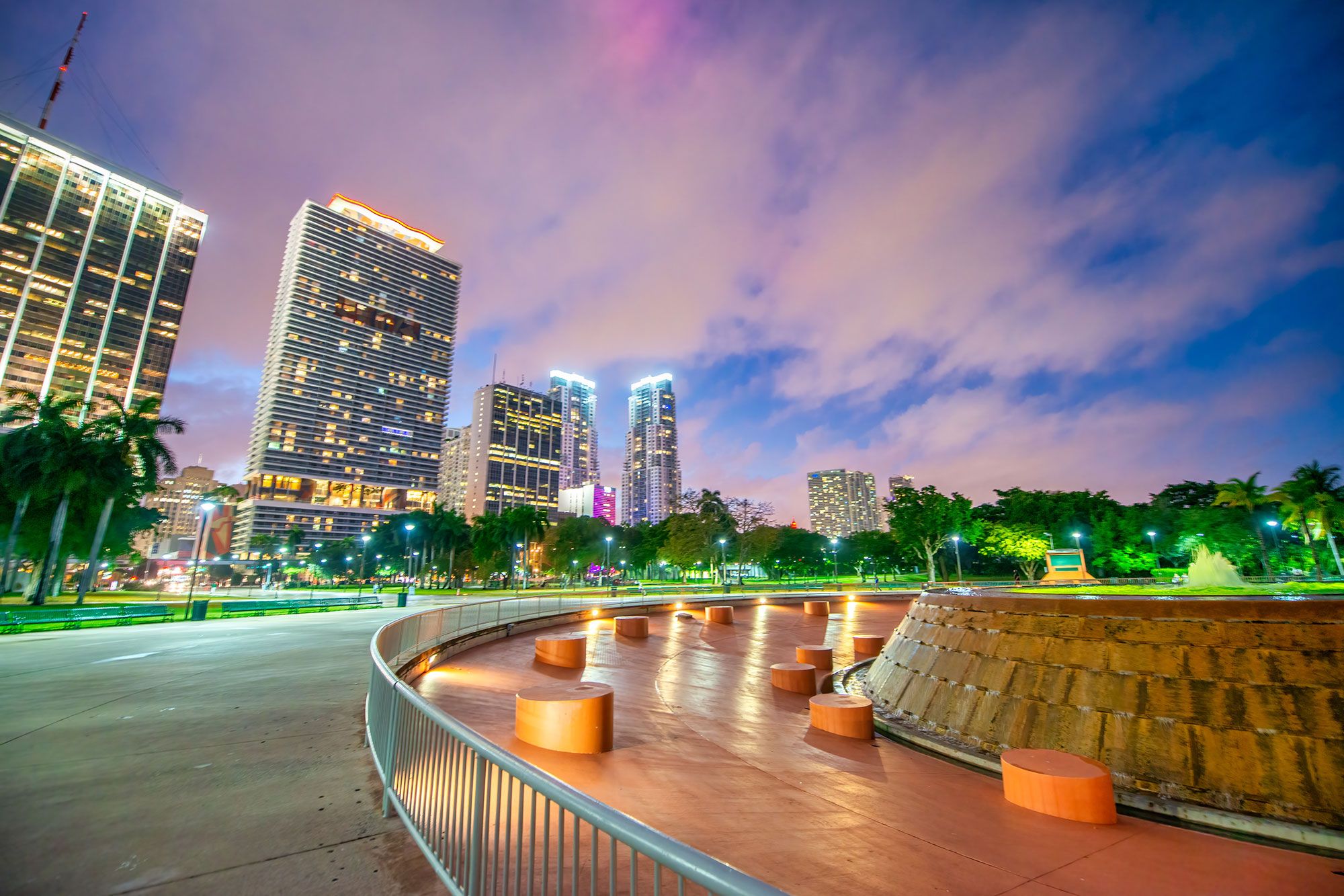 The buildings of downtown Miami at sunset in Bayfront Park.